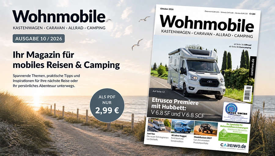 Wohnmobile-Magazin vor sonniger Dünenkulisse